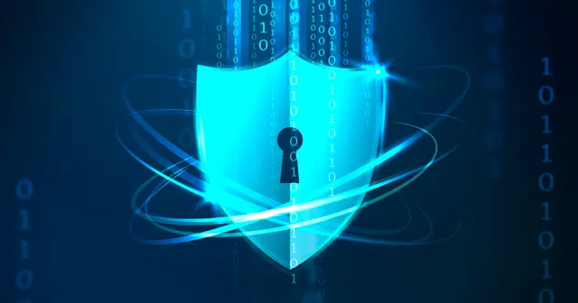 Compliance officer reviewing PCI DSS audit documentation with security awareness training records and phishing simulation reports visible on screen